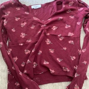 dark red long sleeve with flower design